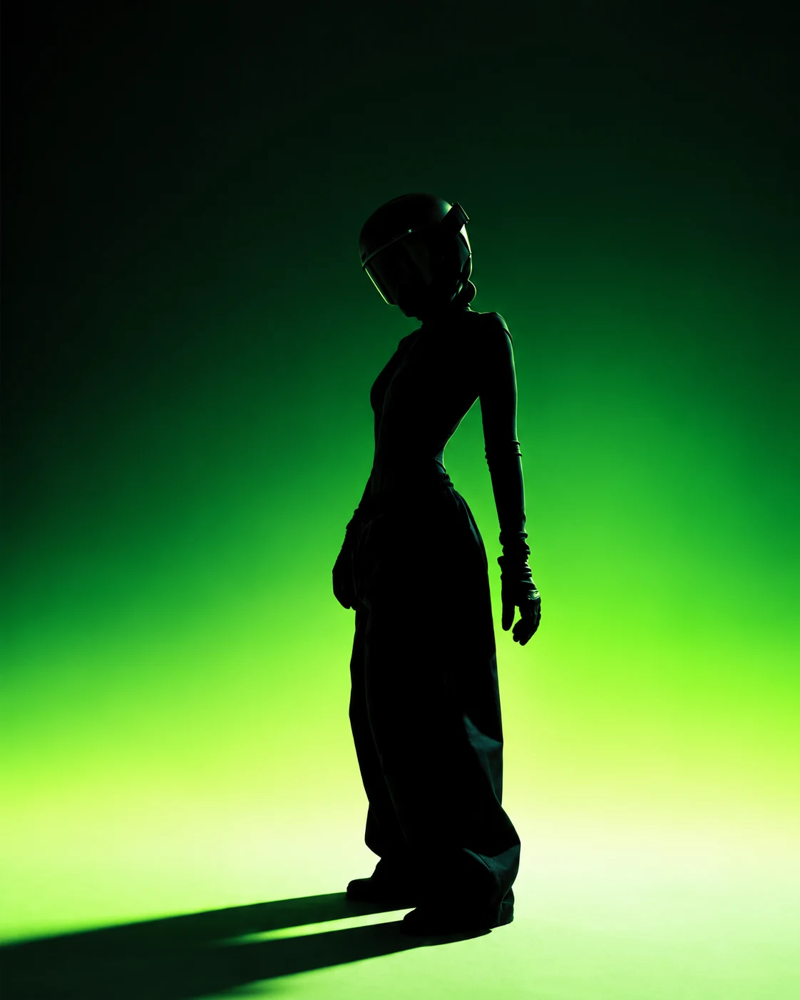 Fashion silhouette in luminous green light