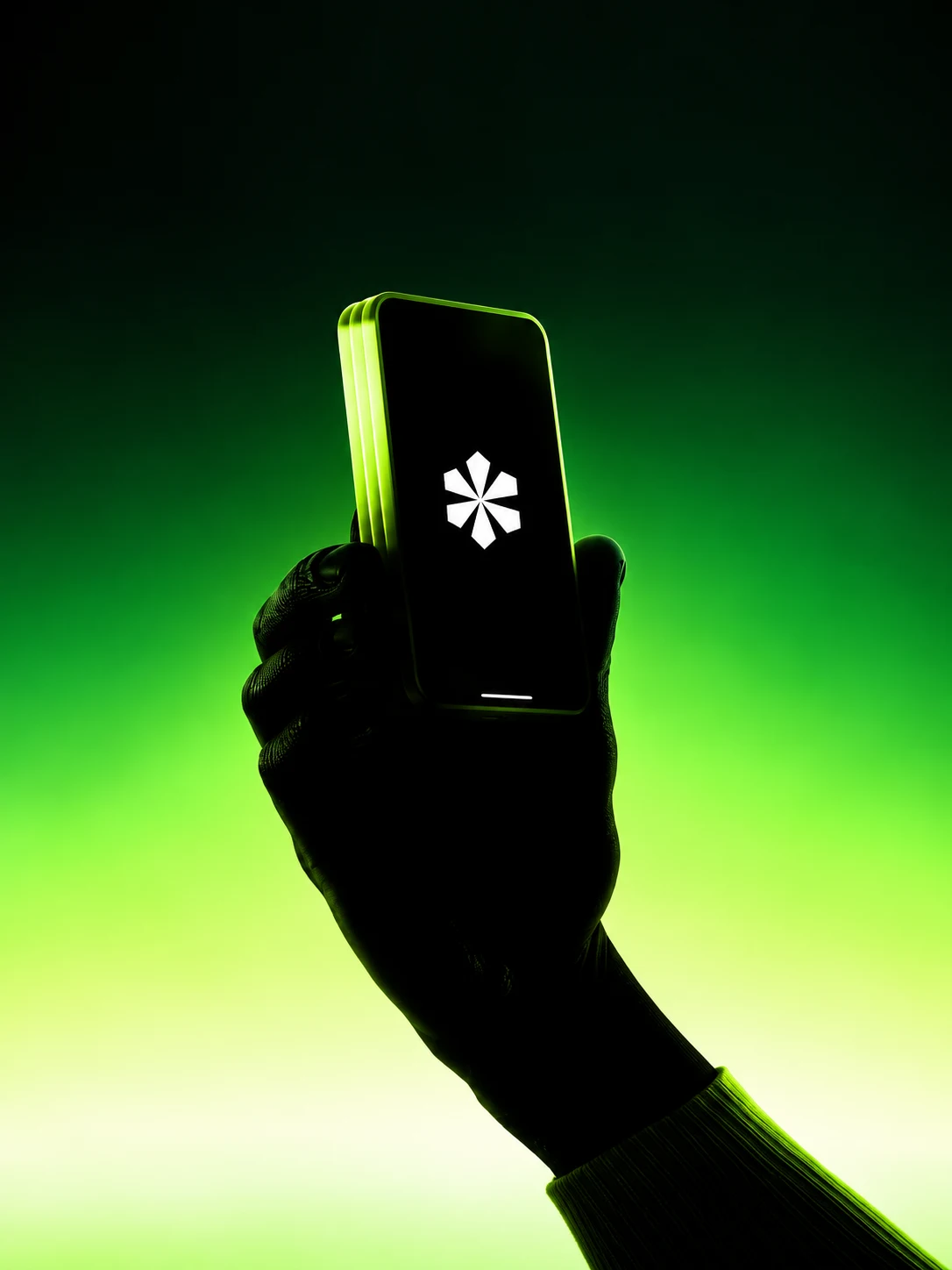 Hand holding the Jaleed phone