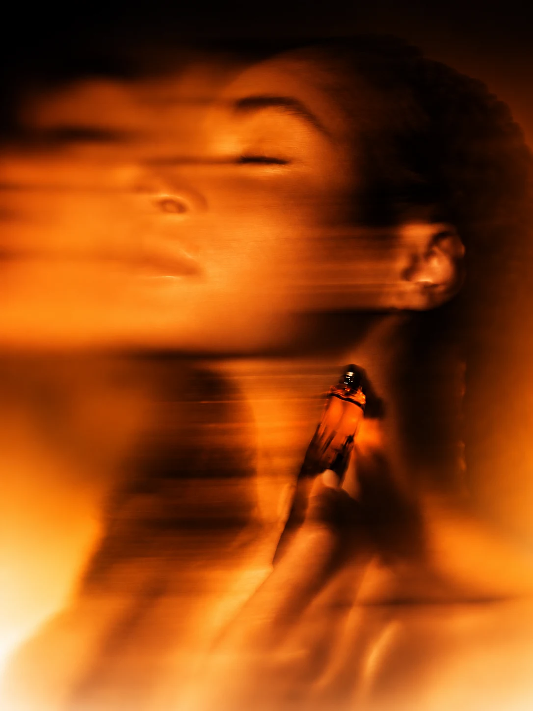 Expressive portrait in orange light
